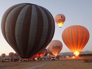 Filling balloons at sunrise